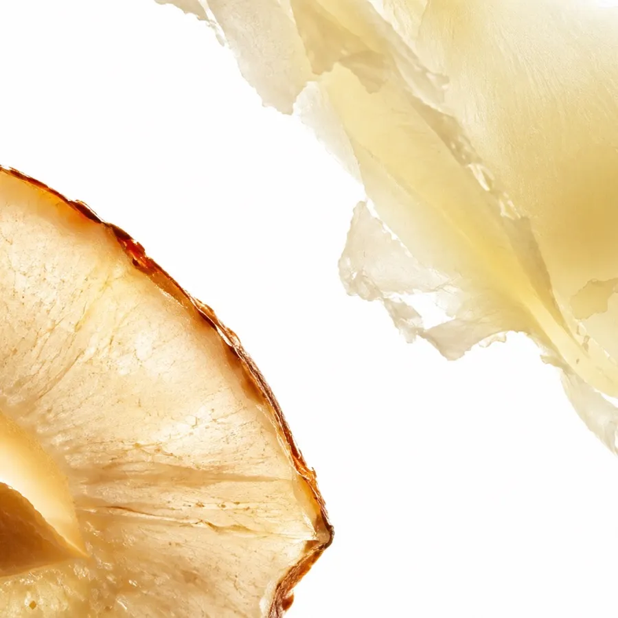 Macro photograph of roasted hazelnuts and white chocolate shards